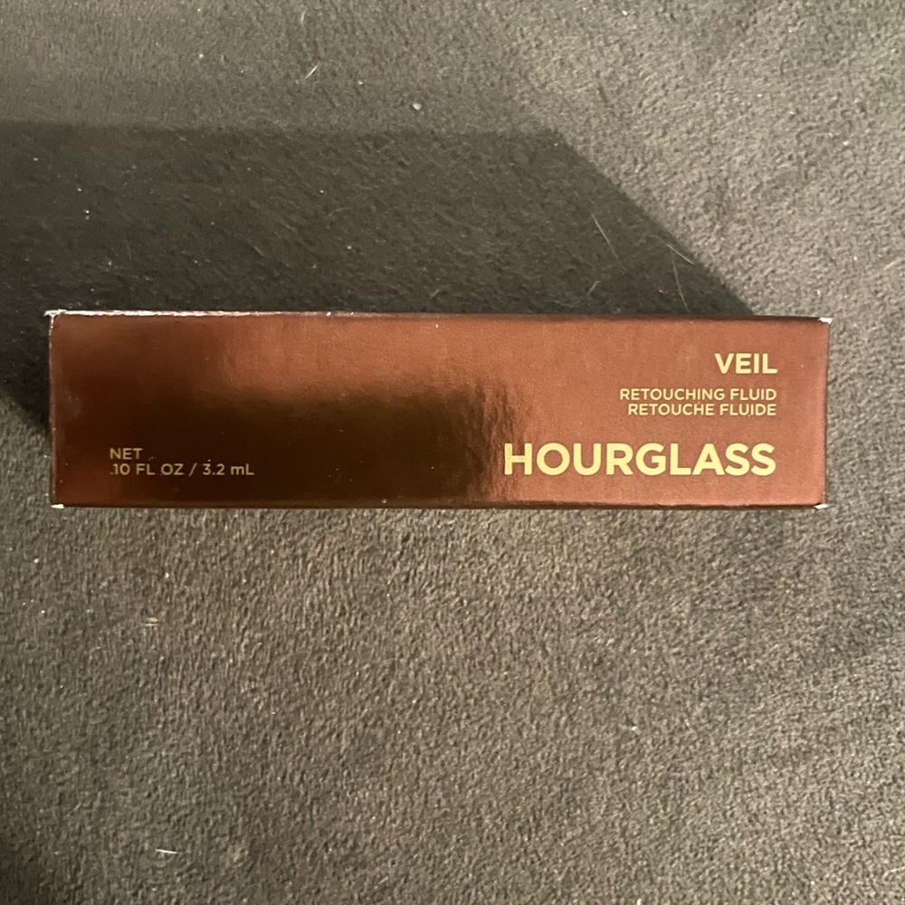 Hourglass retouching fluid